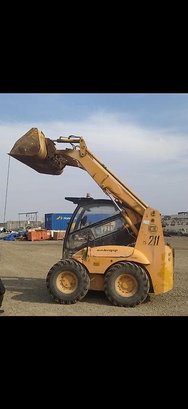 lider disk type 1 per page 40: Kompakt yükləyici (skid steer) – qabaq kovşenli, tam qapalı kabinalı — 1