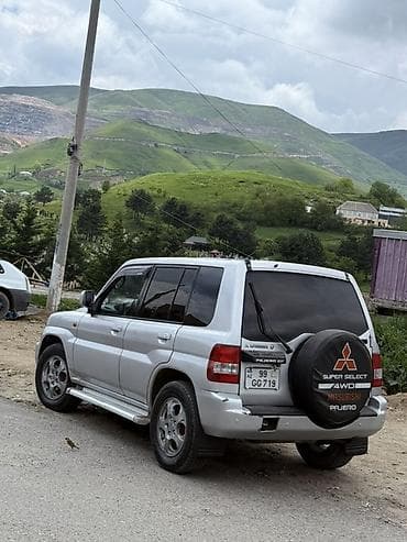 Mitsubishi: Mitsubishi Pajero io 4WD – kompakt, çevik və dağ-yol şəraitinə uyğun — 5