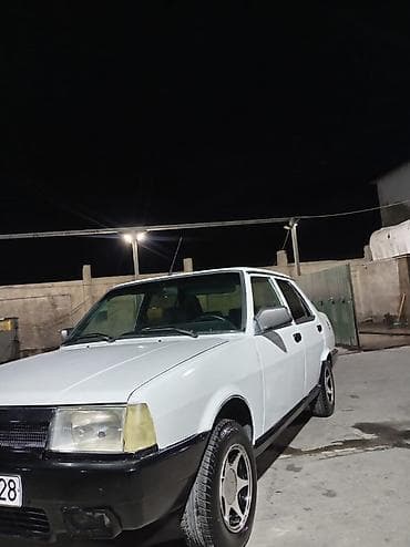 man sat: Model: Tofas (sedan) Kuzov: 4 qapılı, ağ rəng Sükan: solda Yanacaq — 8