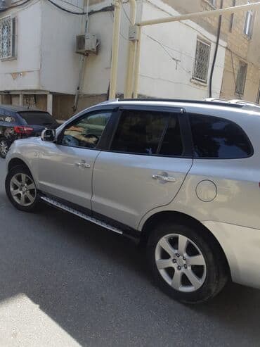 qadınlar ucun maşınlar: Hyundai Santa Fe: 2.2 л | 2007 г. Внедорожник — 7
