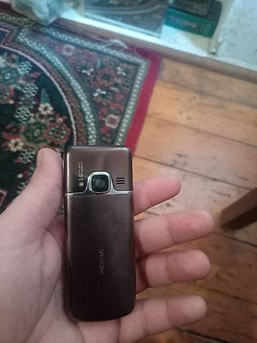 ağdaş telefon: Nokia 2 GB, rəng - Qəhvəyi, Düyməli — 4
