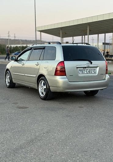 volkswagen polo 1: Toyota Corolla: 1.4 л | 2006 г. Универсал — 3