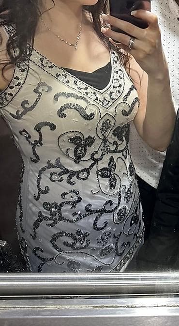 razrezli don: El ishlemesi 700 m alinib 36-40 olcu
Uzeri biserle ishlemedir — 2