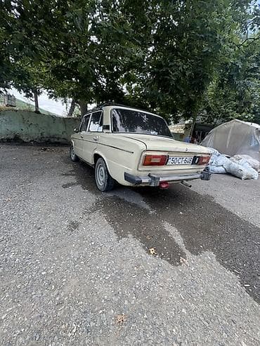 lada 012: VAZ 2106 sedan Xüsusiyyətlər: - Kuzov: 4 qapılı sedan, açıq bej rəng — 2