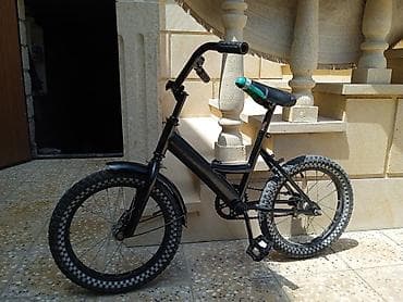 Велосипеды: Uşaq velosipedi – BMX üslubunda, 20" təkərli - Rəng: qara, mat görünüş — 1
