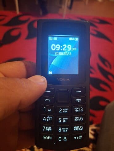 телефон fly ds105d: Nokia 106, цвет - Черный, Кнопочный — 1