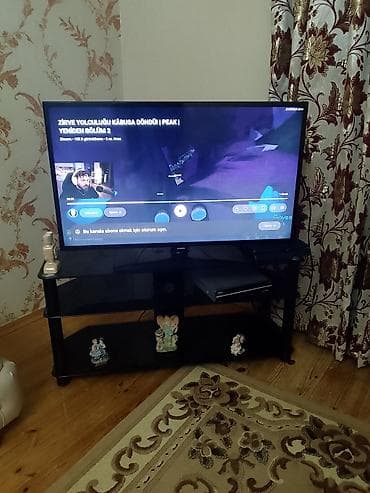 s20 ekran: Samsung LED televizor və şüşə TV stendi - Ekran: təxminən 40–43 düym — 2