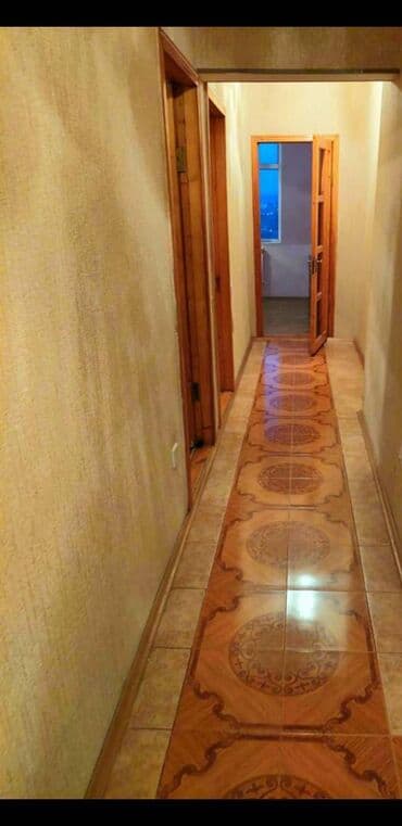 ucuz bina evləri: Nizami rayonunun 24-cü polis bölməsinin qarşısındakı 17 mərtəbəli — 8