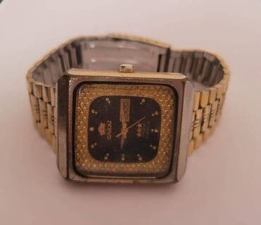 el fecr saat: İşlənmiş, Qol saatı, Orient, rəng - Qızılı — 4