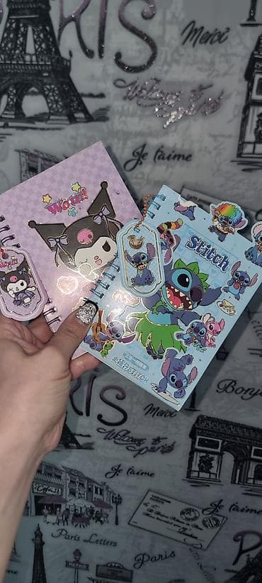 sevgililer ucun hediyyeler: Məhsul: Cizgi qəhrəmanlı yapışqanlı dəftər və stiker dəsti ikisi bir — 1
