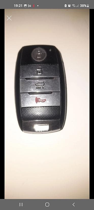 Radiatorlar: Avtomobil üçün uzaqdan idarəetməli açar-brelok - 4 düyməli idarəetmə — 1