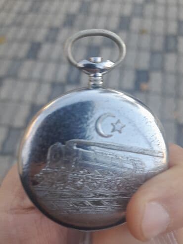 Heykəlciklər: H. Moser & Cie cib saatı Saat işləmir.Üst hissəsi itib.Qiyməti — 3