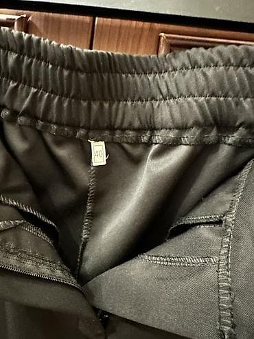 Paltolar: Qara rəngdə geniş kəsimli qadın şalvar. Yan hissələrdə başdan-başa — 5