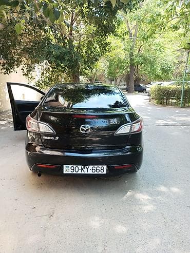 per: Mazda 3, qara rəng, hetçbek kuzov. Texniki və dizayn xüsusiyyətləri — 4