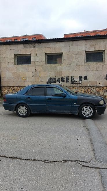 ikinci el guzguler: Mercedes-Benz sedan (W202 C-Class) - Kuzov: 4 qapılı sedan, tünd mavi — 5