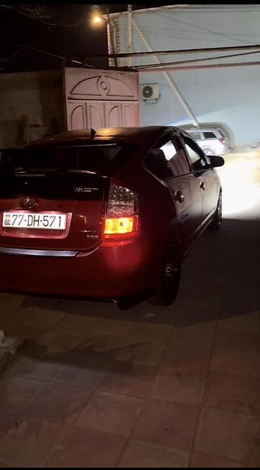 opel astra 1998: Toyota Prius (II nəsil) hibrid liftbek - Rəng: tünd qırmızı — 1