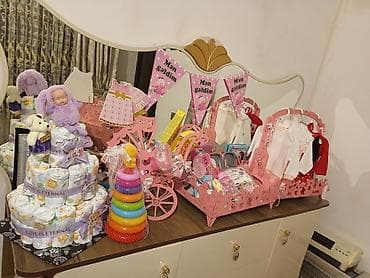 Kamod yaxşı vəziyyətdədir Dəst tərkibi: - Pampers tortu