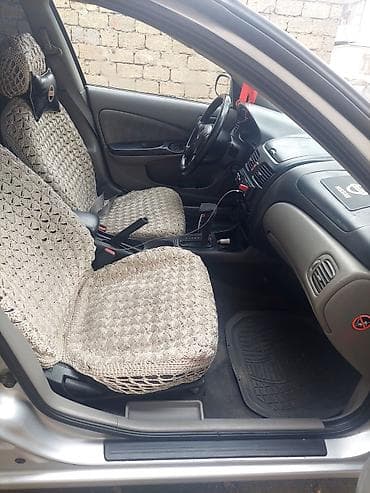 Nissan Primera: 1.6 l | Sedan — 8