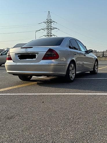 disk 18: Mercedes-Benz E-Class: 3.2 l | 2005 il Sedan — 6