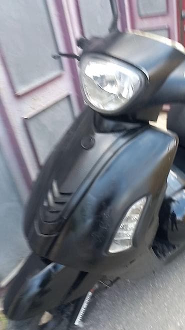 moto kasqa: Skuter – şəhər içi rahat hərəkət üçün kompakt və qənaətcil model — 4