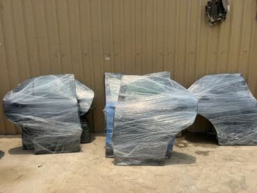 барои сафед кардани руй: Chevrolet Equinox avtomobilinin qapısı. Ağ rəngdədir və avtomobilin — 3