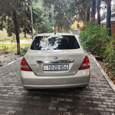 kvadrasikl satılır: Nissan Tiida sedan – gümüşü rəng Texniki xüsusiyyətlər və təchizat: - — 4