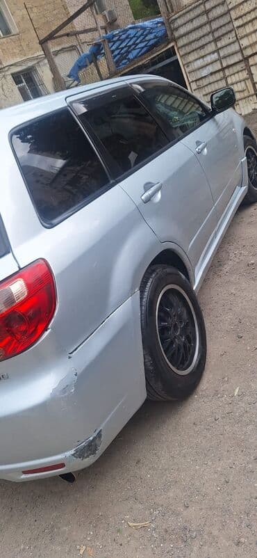 kvadrasikl satışı: Mitsubishi Airtrek Turbo – gümüşü rəngli, sport üslublu universaI/SUV — 4