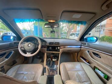 aston martin db7 5.9 at: BMW 5 series: 2.5 l | 2000 il Sedan — 9