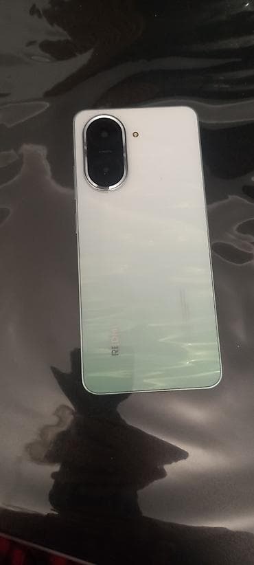 notebook ucuz qiymete: Redmi A5, 128 GB, Sensor, Barmaq izi, İki sim kartlı — 6