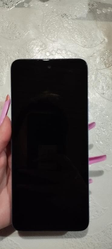 Redmi smartfon – açıq göy rəngdə korpus Xüsusiyyətlər: - Ekran: tam