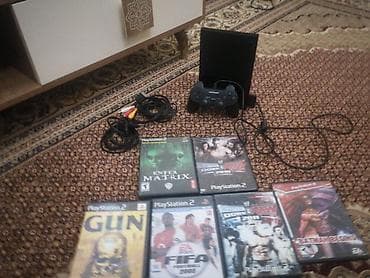 pleşteşin: PlayStation 2 (Slim) oyun konsolu seti Paket tərkibi: - PlayStation 2 — 1