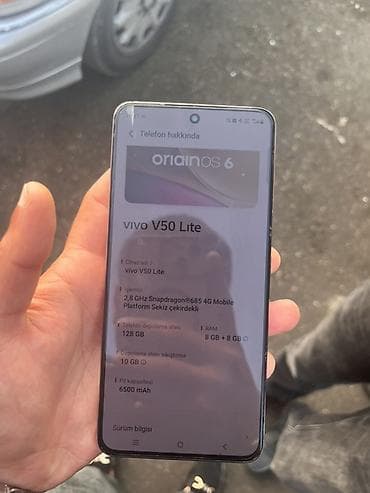 dondurucu satilir: Vivo X50 Lite, 128 GB, rəng - Çəhrayı, Barmaq izi, Face ID — 1