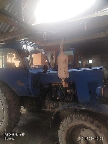 teker 18 type 1 per page 40: Mavi rəngli təkərli traktor - Kabinli, ikiqapılı konstruksiya - Dizel — 3