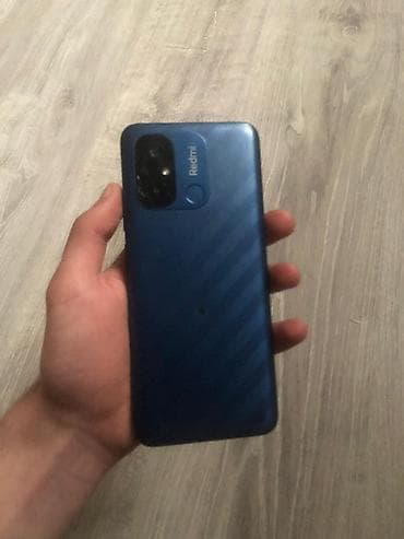 xiomi redmi 12: Xiaomi Redmi smartfon - Model: Redmi (mavi rəng, arxa paneldə Redmi — 2