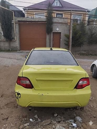 opel astra 98: Model: Daewoo Nexia (sedan) Rəng: açıq sarı Kuzov: 4 qapı, ön və arxa — 4