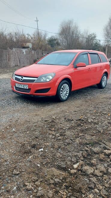 pobeda (maşın): Opel Astra: 1.3 l | 2009 il Universal — 2