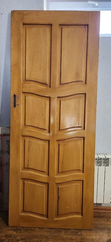 qapi taxda: Otaq qapısı - Material: təbii ağac, laklı səth - Dizayn: 8 panelli — 2