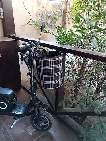 acar pult: Elektrikli skuter. 10 Ah. Tam doldurma ilə 20-25 km. Sürət təxminən 20 — 2