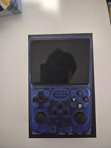 oyun konsoları: Daşınan Retro Oyun Konsolu – mavi şəffaf korpus Xüsusiyyətlər: - — 1
