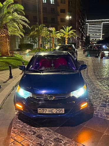 Honda Insight: 1.3 л | 2013 г. Седан — 1