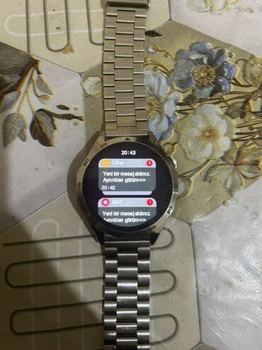 bluetooth klaviatura: Metal qayışlı, dairəvi displeyli ağıllı saat. Xüsusiyyətlər: - Tam — 5