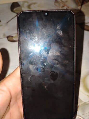 Məhsul: Sensorlu ekranlı smartfon - Ön tərəfdə damla tipli kameraya