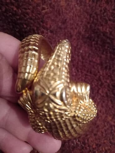 Qizil suyunda rengi getmiyen polad timsah formasında qolbaqi.cox