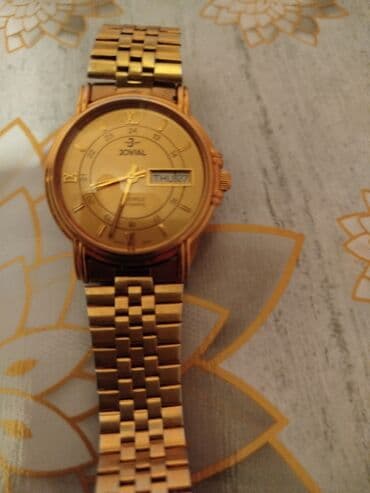 750 prob qızılın lom qiymeti 2024: Qol saatı, rəng - Qızılı — 10