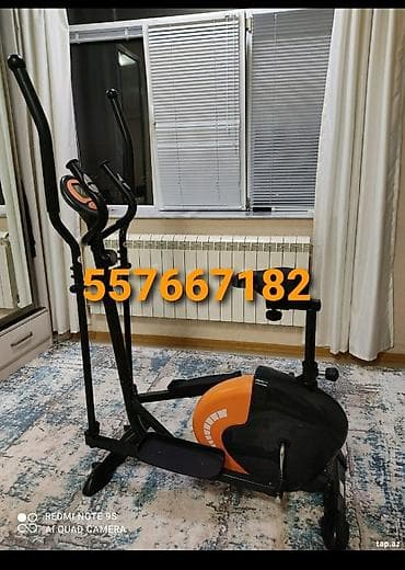 Evdə kardio məşqləri üçün nəzərdə tutulmuş qara və narıncı rənglərdə