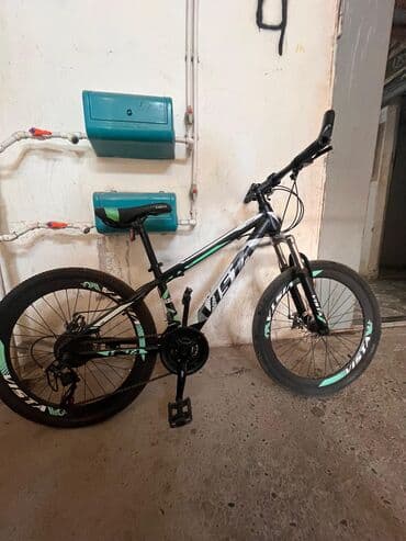 velosipedlər qiz ucun velosipedler: VISTA modeli, qara, ağ və yaşıl rənglərdə olan bu velosiped, yoxuşlu — 8