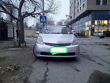 opel vectra a: Toyota Prius, gümüşü rəng, 5 qapılı liftbek. Hibrid benzin-elektrik — 1