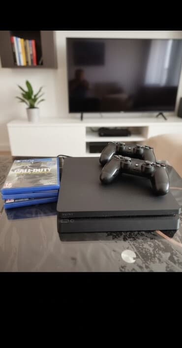 playstation 4 slim qiymeti: Az işlənib Salonda işləməyib disklər üstündə verilir təcili satılır — 1