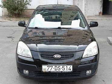 Kia Rio hatchback (qara rəng), 5 qapılı şəhər avtomobili. Xarici: -