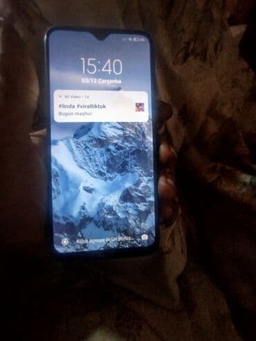 OnePlus: Xiaomi Redmi seriyalı smartfon - Ekran: tam ölçülü çərçivəsiz ekran — 1